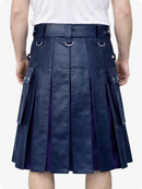 Person wearing a navy pleated kilt on a white background