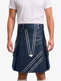 A man wearing a dark navy blue leather kilt with white geometric line patterns, paired with a white t-shirt, shown from the chest down against a light gray background.