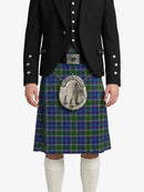 Person wearing a traditional Scottish kilt with a jacket on a white background
