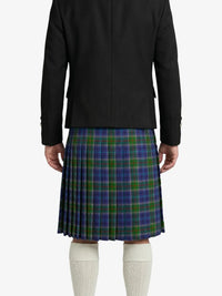 Person wearing a black jacket and a green plaid kilt on a white background