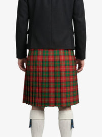 Person wearing a red and green plaid kilt on a white background