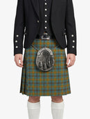 Person wearing a traditional Scottish kilt with a sporran on a white background
