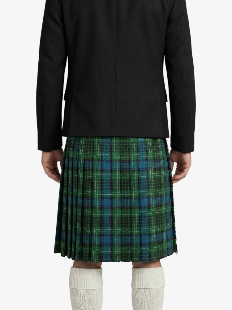 Person wearing a black jacket and green plaid kilt on a white background