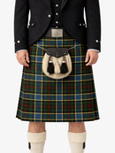 Person wearing a traditional Scottish kilt with a tartan pattern on a white background