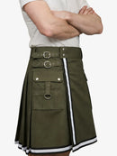 Person wearing a green kilt with white accents on a plain background