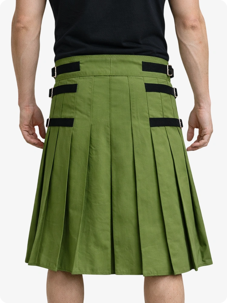 Olive Green pleated skirt with black straps worn by a person on a white background