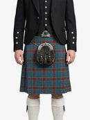 Person wearing a traditional Scottish kilt with a sporran on a white background