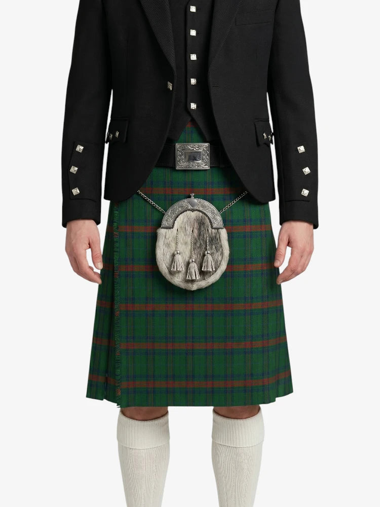 Person wearing a traditional Scottish kilt with a white background