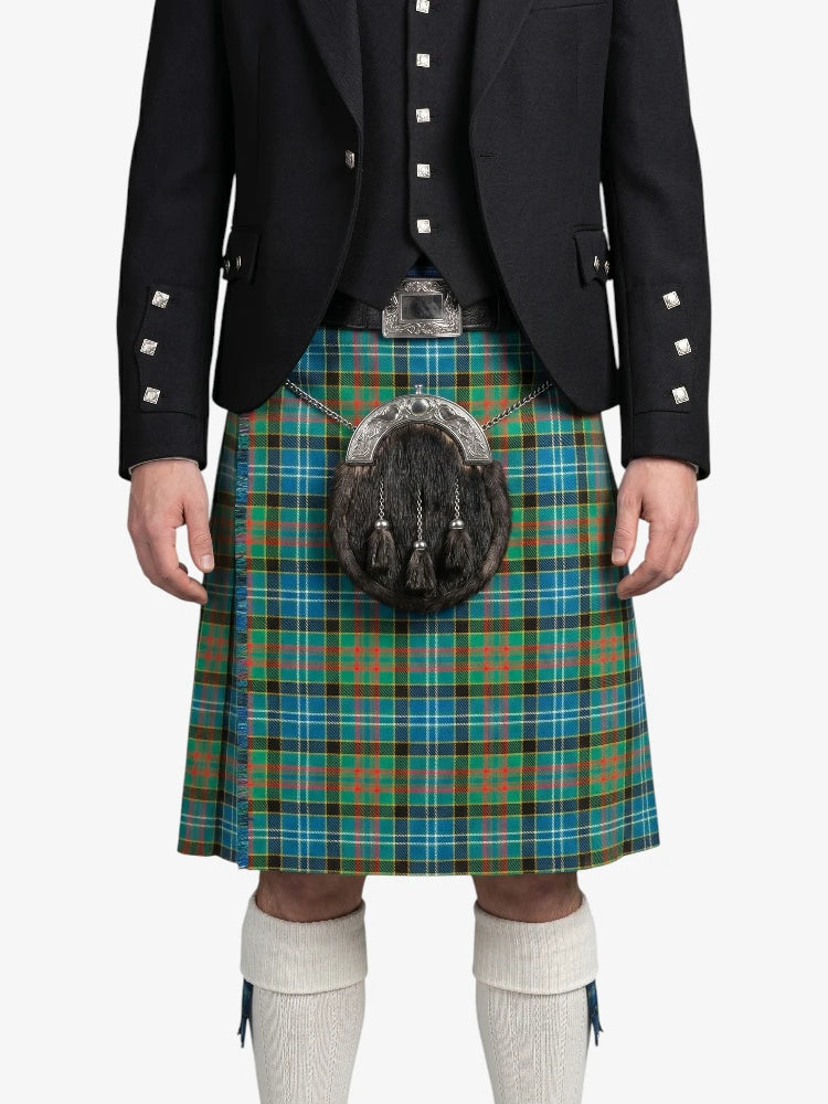 Person wearing a traditional Scottish kilt with a tartan pattern on a white background