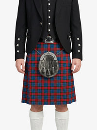 Person wearing a traditional Scottish kilt with a sporran on a white background