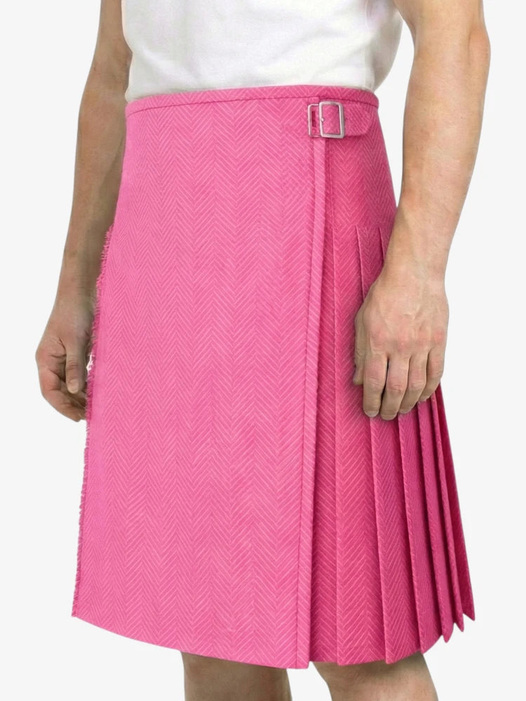 Pink pleated skirt with a belt on a white background