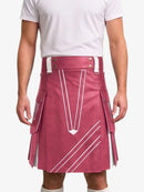 A man wearing a pink faux-leather kilt with white geometric stripe patterns, a white t-shirt, and white socks, shown from the chest down against a light gray background.