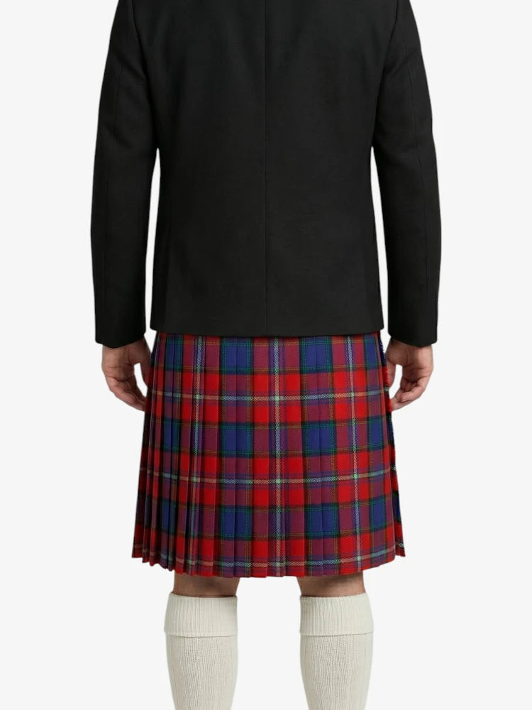 Person wearing a black jacket and red plaid kilt on a white background