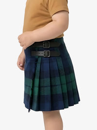 Person wearing a blue and green plaid skirt with a belt on a white background