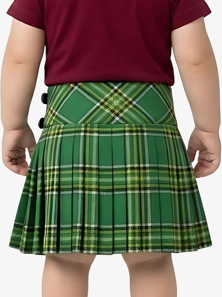 Green plaid skirt worn by a child on a white background