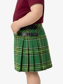 Green plaid skirt worn by a person on a white background
