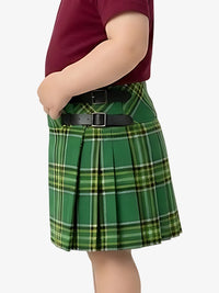 Green plaid skirt worn by a person on a white background