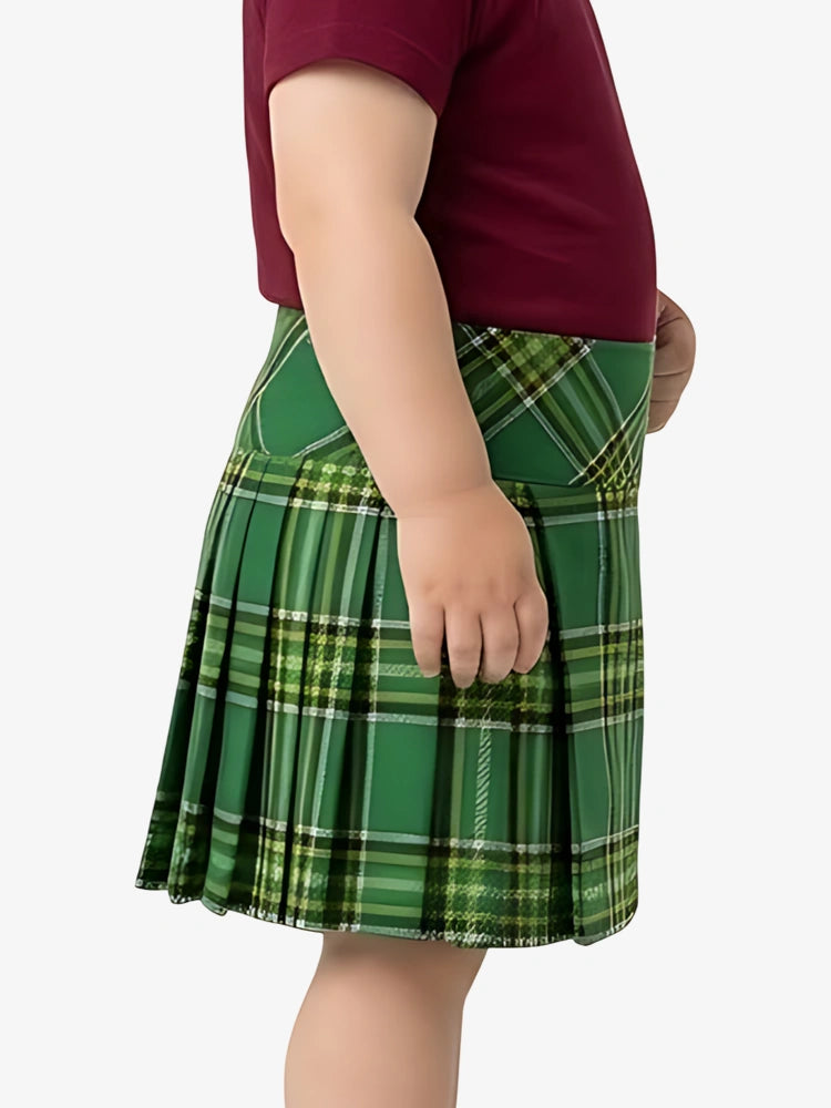Green plaid skirt worn by a person on a white background