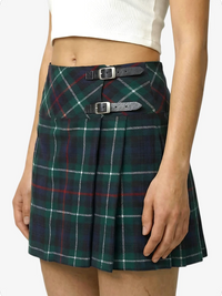 Plaid skirt with belt on a plain background