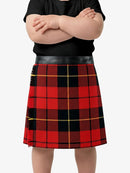 Person wearing a red and black plaid skirt with a plain background