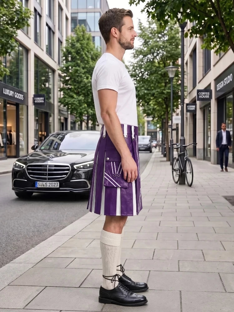 A man stands on a city sidewalk wearing a purple and white striped kilt, a white t-shirt, cream-colored knee-high socks, and black leather shoes. A black Mercedes-Benz is parked on the street behind him, with trees and storefronts in the background.