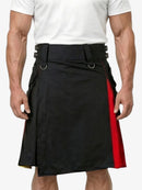 Black kilt with red accents worn by a person on a white background