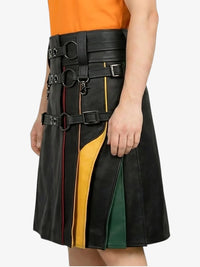 Black leather skirt with colorful accents worn by a person on a white background