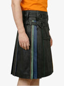Black leather skirt with colorful accents worn by a person on a white background