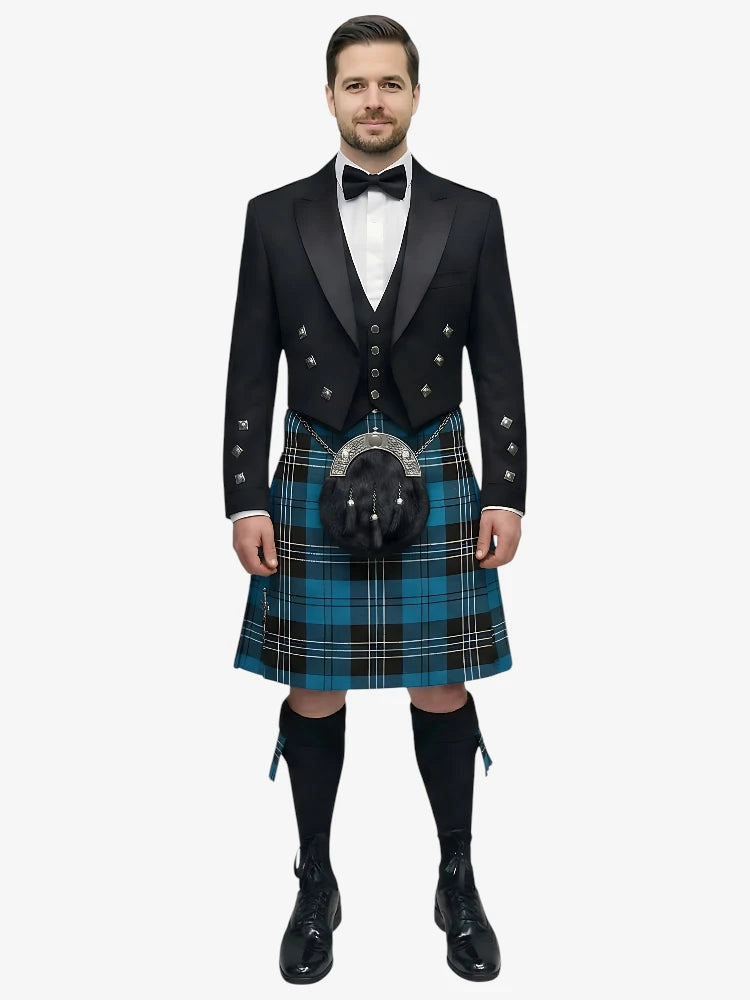 Man wearing a traditional Scottish ramsay blue tartan kilt with a black prince charlie jacket and bow tie on a white background