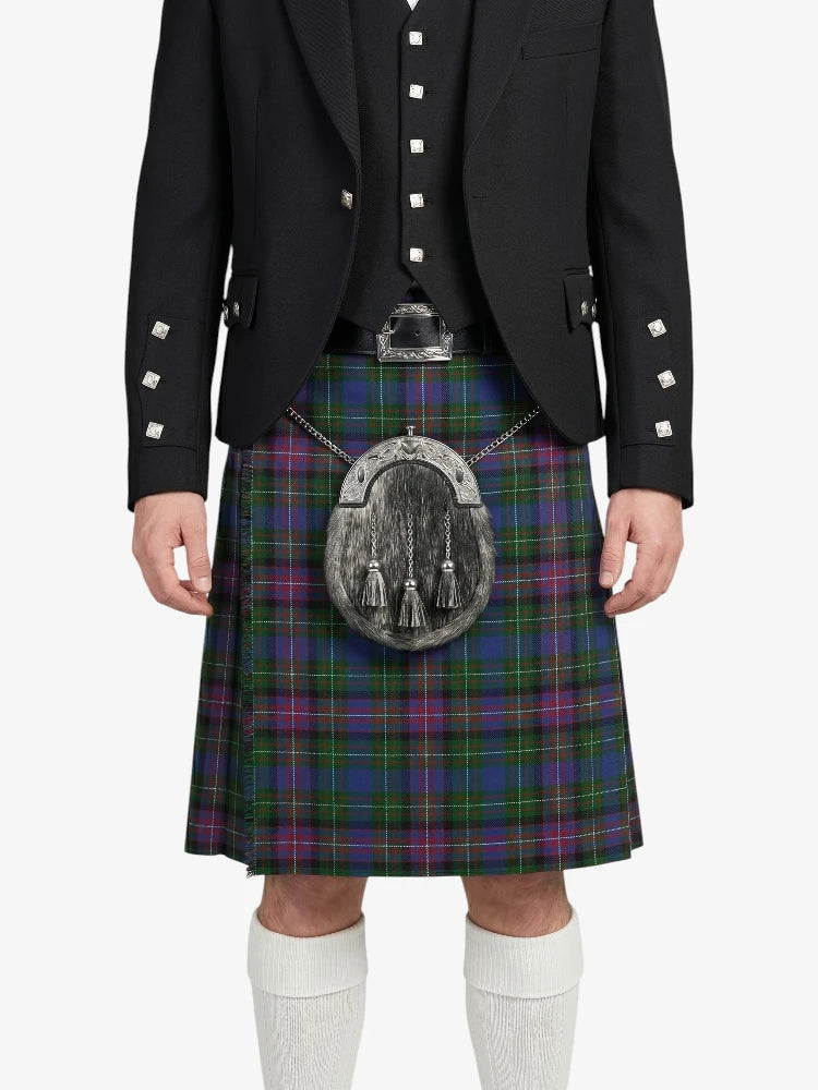 Person wearing a black jacket, tartan kilt, and white socks on a white background
