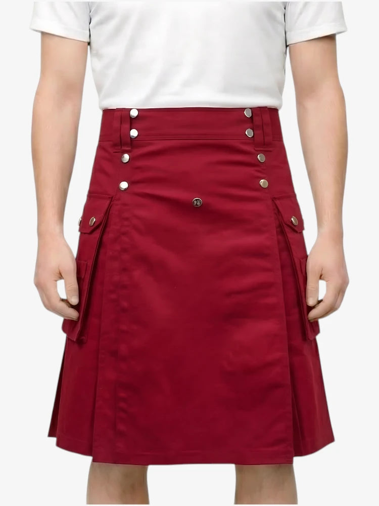 Red skirt with button details worn by a person on a white background