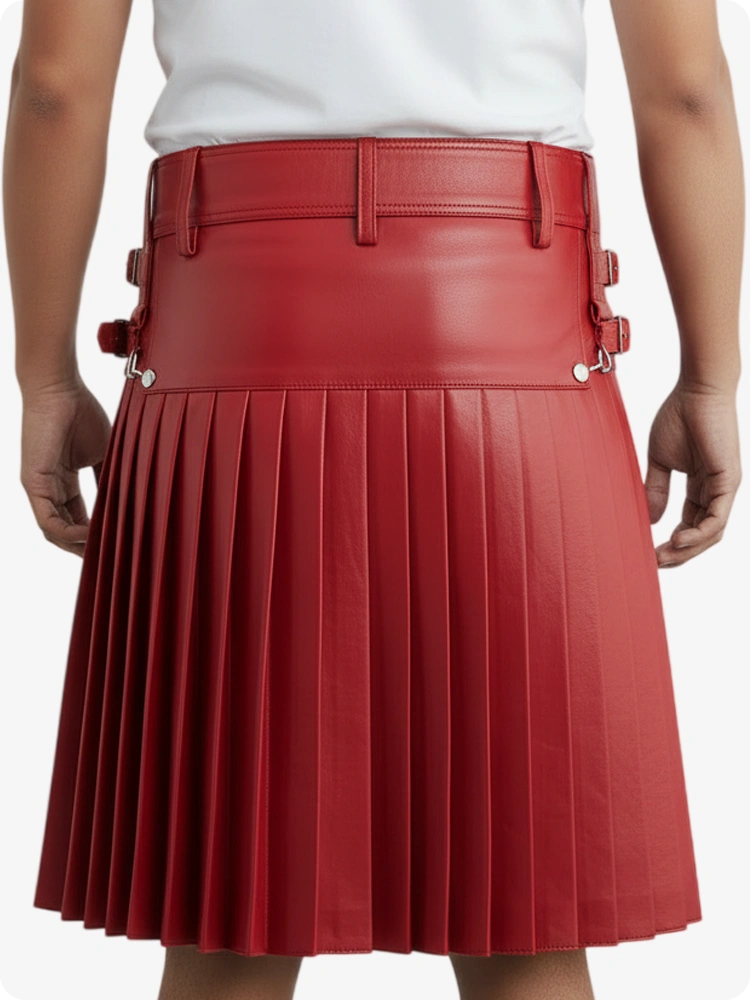 Red pleated skirt worn by a person on a white background