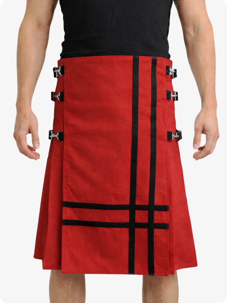 Red kilt with black straps worn by a person on a white background