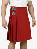 Red pleated kilt with black belt on a white background
