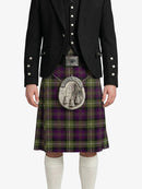 Person wearing a black jacket, purple plaid kilt, and white knee-high socks on a white background