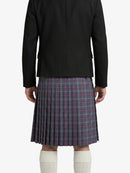 Person wearing a black jacket and plaid kilt on a white background
