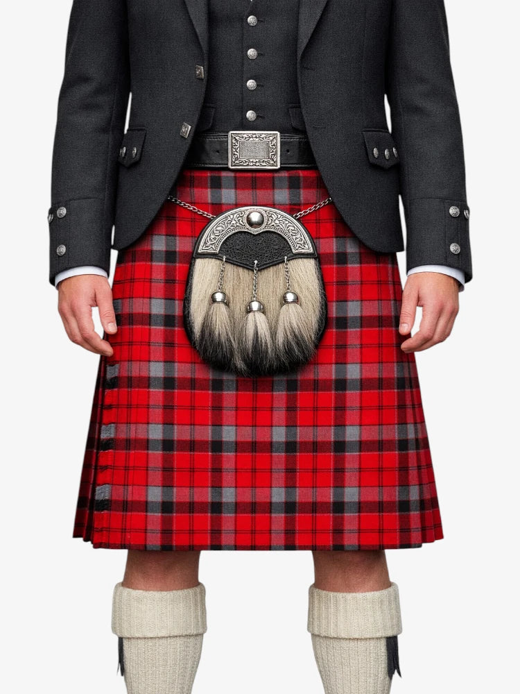 Person wearing a red tartan kilt with a black jacket and white knee-high socks on a white background