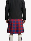 Person wearing a black coat and red and blue plaid kilt on a white background