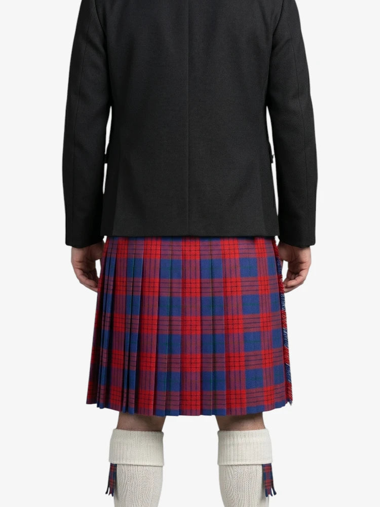 Person wearing a black coat and red and blue plaid kilt on a white background