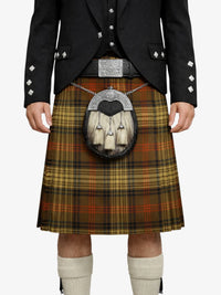 Person wearing a traditional Scottish kilt with a tartan pattern on a white background