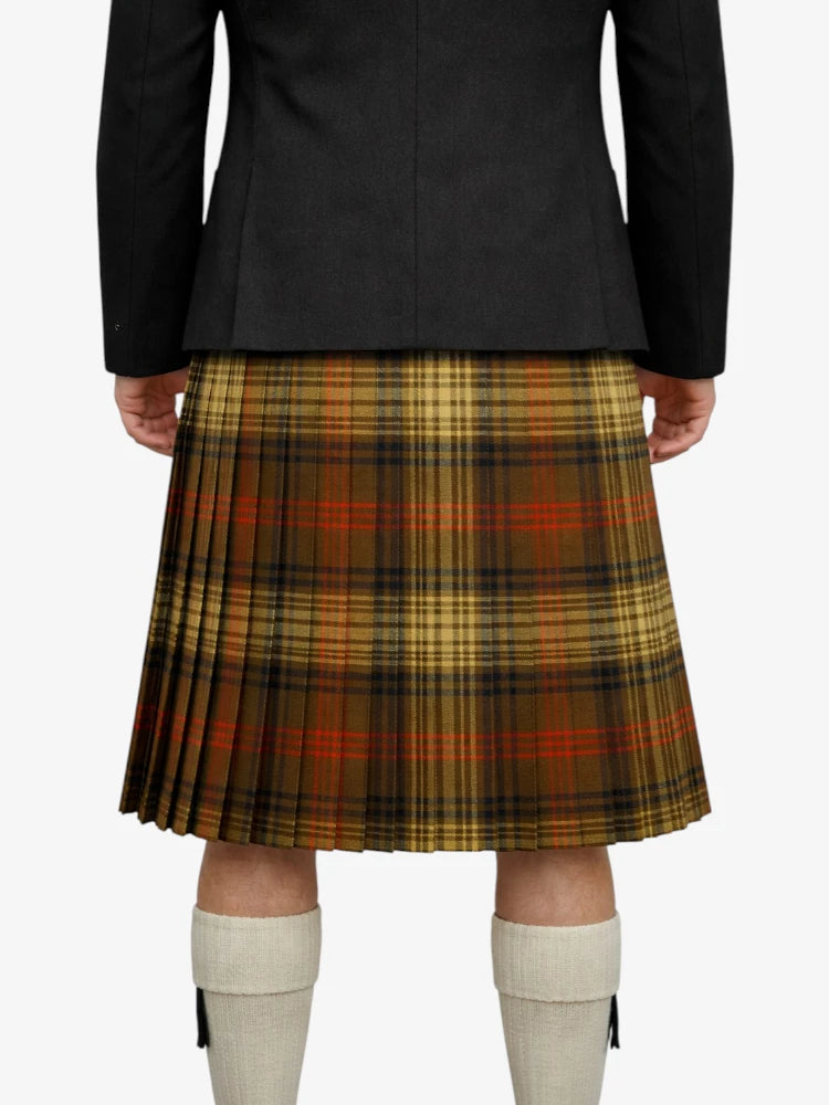Person wearing a black jacket and plaid kilt on a white background