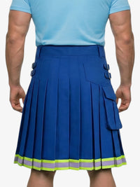Person wearing a blue pleated skirt with reflective stripes on a plain background