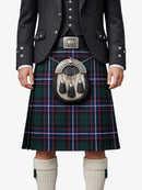 Person wearing a traditional Scottish kilt with a tartan pattern on a white background