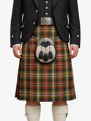Person wearing a traditional Scottish kilt with a tartan pattern on a white background
