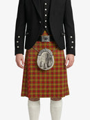 Person wearing a traditional Scottish kilt with a matching jacket on a white background