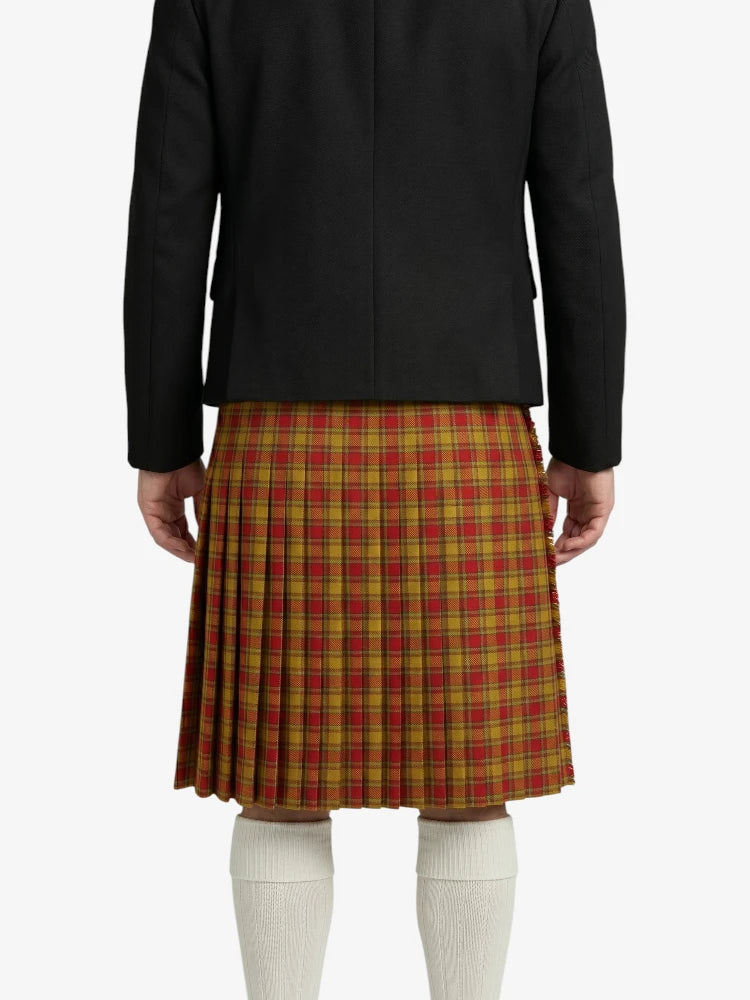 Person wearing a black jacket and red plaid skirt on a white background