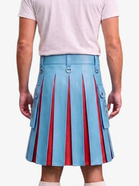 A model from the back wearing a light blue pleated leather kilt with red vertical stripe details and silver-tone hardware, paired with a light pink t-shirt.