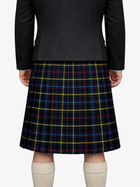 Person wearing a dark gray jacket and a blue plaid kilt on a white background