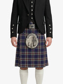 Person wearing a black jacket and plaid kilt with a silver sporran on a white background