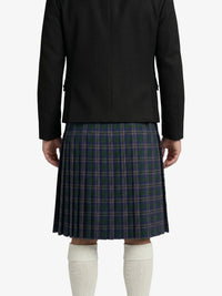 Person wearing a black jacket and plaid kilt on a white background